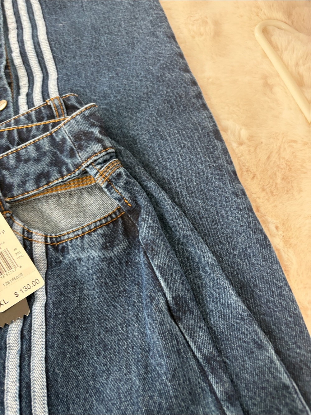 adidas Dark Denim Wide-Leg Jeans with Orange Stitching.  Beyoncé Ivy Park